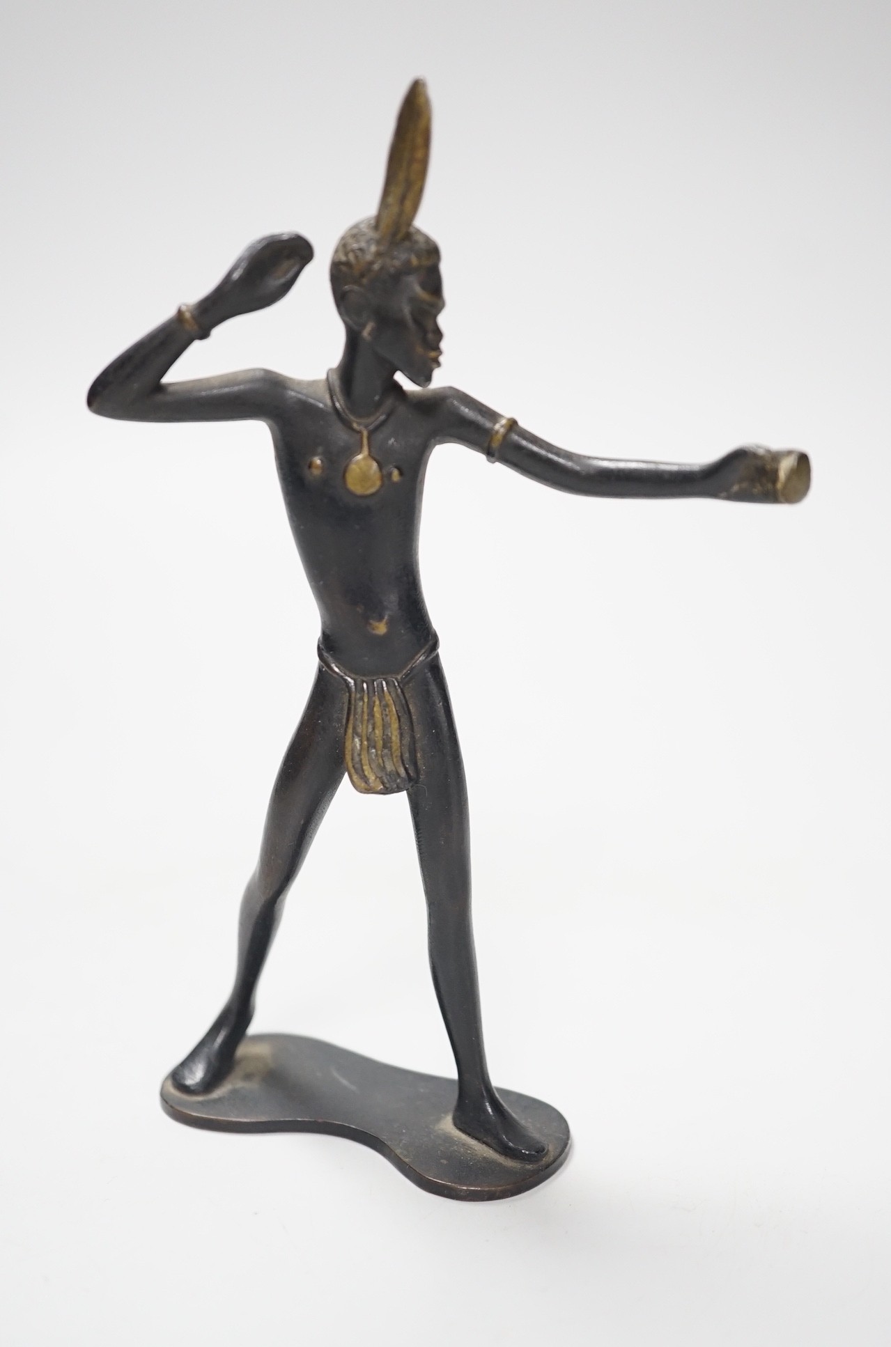 An Austrian patinated bronze figure of a tribesman by Richard Rohac, 13.4cm